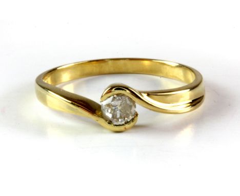 An 18ct yellow gold (stamped 18k) diamond set solitaire ring, (N).