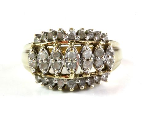 A large 18ct yellow gold diamond set ring, (O),