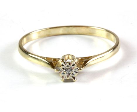 A 9ct yellow gold diamond set solitaire ring, (N.5).