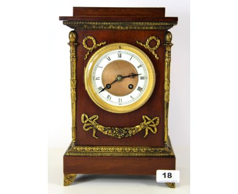 An Edwardian ormolu mounted mahogany mantle clock, H. 30cm.