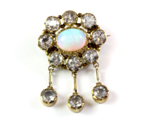 A late Victorian yellow metal (tested 15ct gold) pendant/ brooch set with white spinel and opal, 3. 5 x 2.5cm.