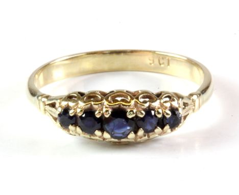 A 9ct yellow gold (stamped 9ct) sapphire set ring, (Q.5).