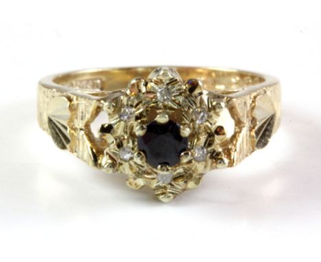 A 9ct yellow gold sapphire and diamond set cluster ring, (K).