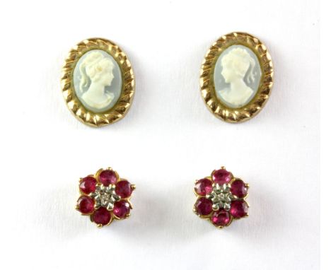 A pair of 9ct yellow gold ruby and diamond cluster earrings, with a pair of gold mounted Wedgwood pate sur pate stud earrings