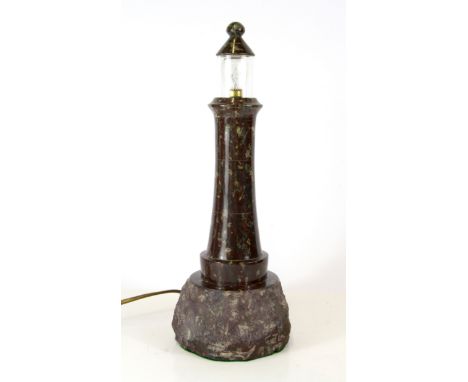 A carved Serpentine stone lighthouse table lamp, H. 34cm.