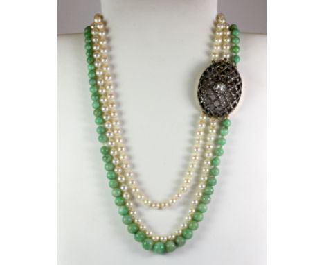 A two row pearl and graduated jade bead necklace with a Georgian white metal (tested silver) clasp set with rose cut diamonds