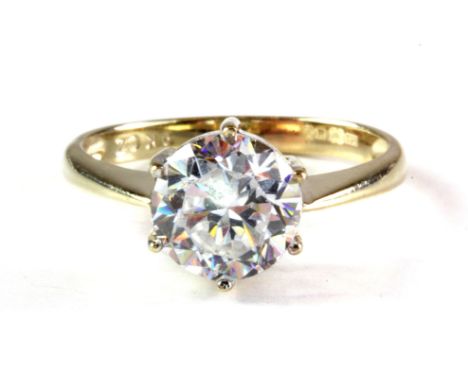 A 9ct yellow gold stone set ring, (M).