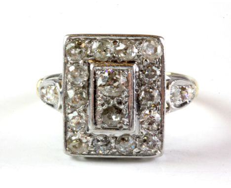 An 18ct yellow gold and platinum large ring set with old cut diamonds, (N).