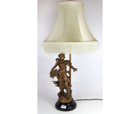 An Art Nouveau spelter table lamp and shade, H. 79cm.