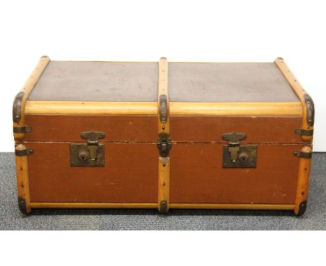 A good quality vintage travelling trunk, W. 77cm, D. 34cm.