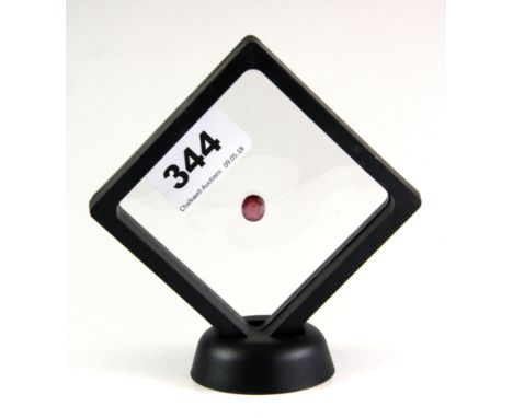 An oval cut 4.6ct ruby in a display stand with a MGL certificate, 1 x 0.9cm.