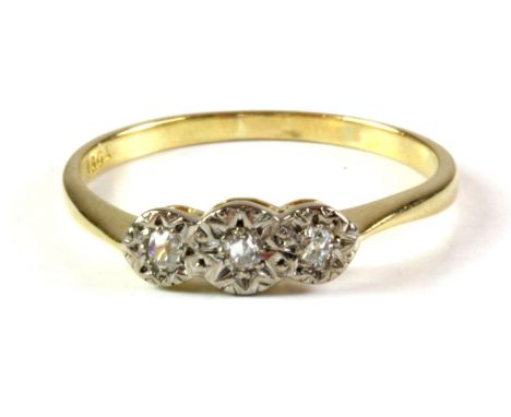 An 18ct yellow and white gold three diamond set ring, (Q.5).