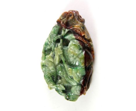 A lovely Chinese carved mixed colour jade amulet of a fisherman and his catch, H. 6.5cm.