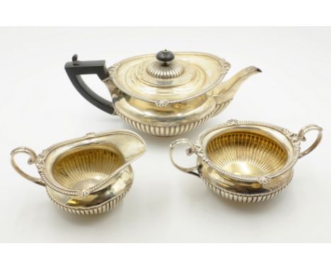 Victorian three piece silver tea service by Alfred Benson & Henry Hugh Webb London 1890, the base of teapot engraved Hunt & R