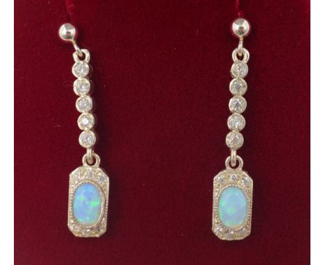 Pair of opal silver drop ear-rings stamped 925   Condition Report   Click here for further images, condition, auction times &