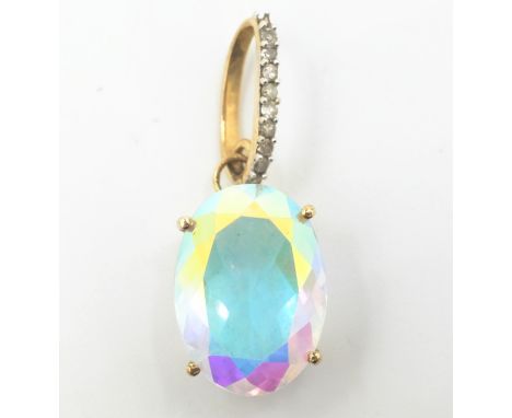 Diamond and opal white mystic quartz pendant tested 9ct gold Condition Report Approx 2.2gm quartz = 1.4cm length one diamond 