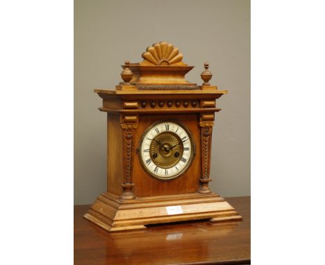 Victorian oak Architectural mantle clock with circular dial, twin train German HAC movement striking the half hours on a coil