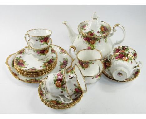 Royal Albert Old Country Roses part tea service, including a teapot, milk jug and sugar basin. 