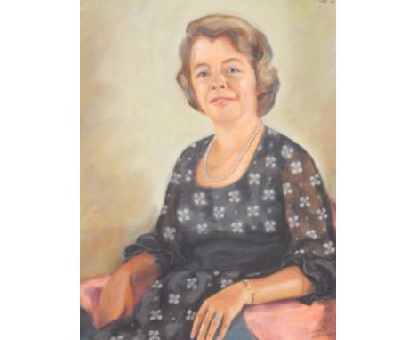 Susan Williams (20thC). Half length portrait of a seated lady, pastel, signed, dated '69, 64cm x 49cm.