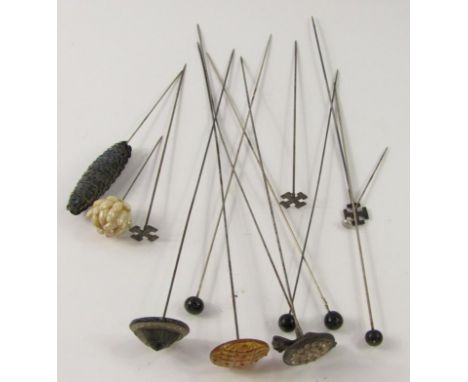 Late 19thC and other hat pins, one with a compressed circular top set with small stones, 31cm high, quantity of others, stick