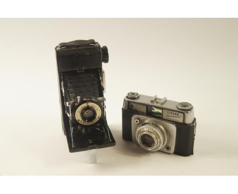 An Ilford Sportsman camera, in black with chrome mounts with Stinheil Nunchen 1:2.8/45mm lens and a King Penguin Kershaw 8:20