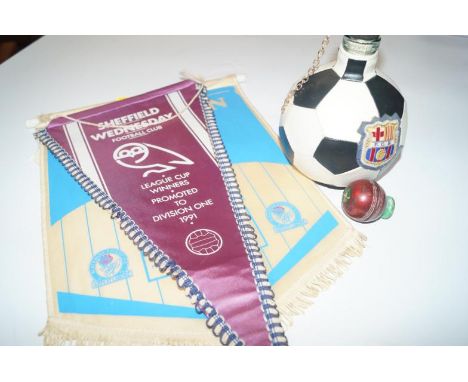 A collection of football related memorabilia, including Munich 1974 Pied Piper Liquor flask, two pennants for Sheffield Wedne