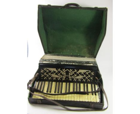 A Celanti accordian, one hundred and twenty button, cased.