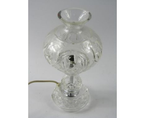 A Waterford cut glass table lamp and shade, 31cm high, boxed.