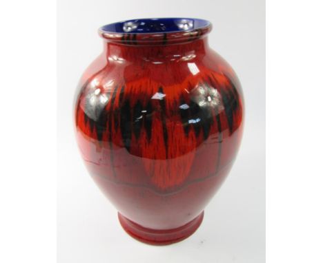 A large Poole Pottery ovoid vase, 24cm high.