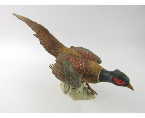 A Goebel Pottery figure of a Cock Pheasant, running, 28cm high.