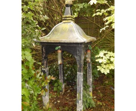 An early 20thC painted garden arbour, with lantern lead metal top and ovoid finial on square supports, 213cm high.