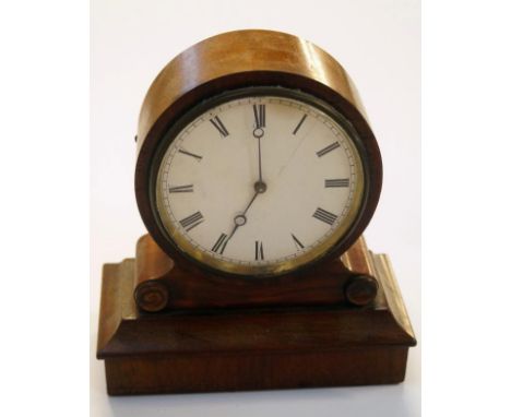 A 18thC walnut cased mantel clock, the circular 9cm dia Roman numeric dial fitted in a scroll case on a stepped base, 19cm hi