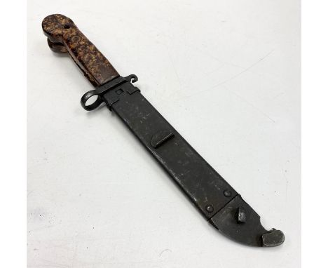 Gulf War Relic AK-47 Bayonet. A veteran?s bring back. The scabbard when conjoined with the blade doubles up as a wire cutter.
