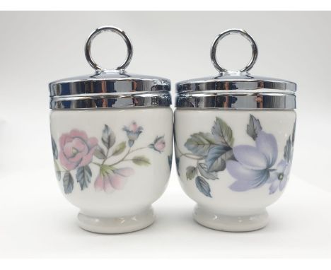 A pair of Royal Worcester egg coddlers. Unused and in the original Royal Worcester box. 'June Garland' design, full markings 