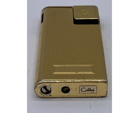 Vintage Colibri lighter, Molectric model, engine turned design. Original case and paperwork. 