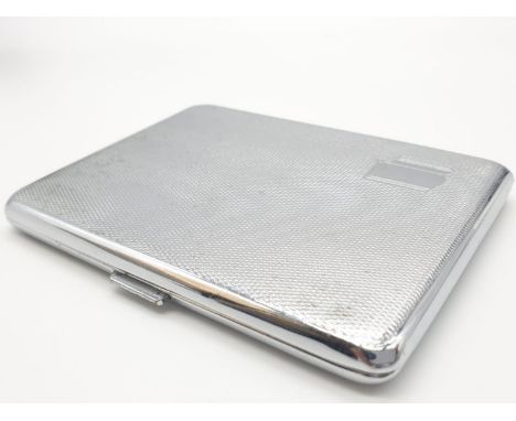 Vintage Sylva Chrome cigarette case, engine turned design ,fastening clasp closes perfectly,blank cartouche. 