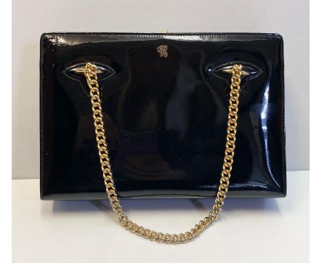 Vintage Gucci styled black patent handbag. Gold chain strap, unusual clasp on top. Interior zip needs attention. Bag measures