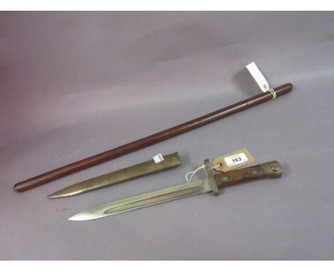 Small bayonet with scabbard, the blade inscribed W.G. together with a leather covered swagger stick