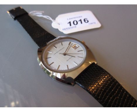 Gentlemans Girard Perregaux titanium cased wristwatch with silvered dial, quartz movement, date aperture and leather strap