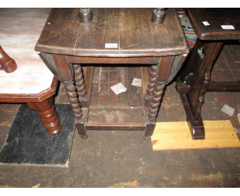 Mid 20th Century oak drop-leaf oval gate leg table on barley twist supports