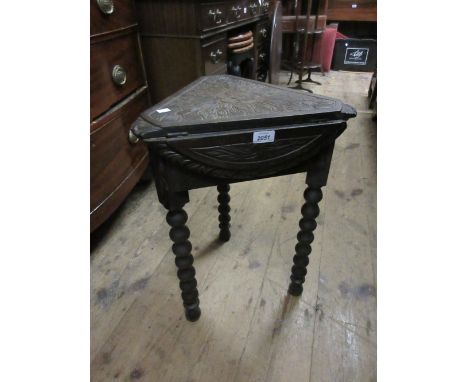 Small carved oak triangular drop-leaf table on bobbin turned supports, two small wall mirrors and an aneroid barometer