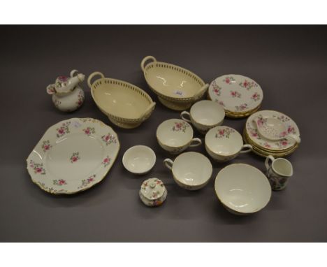 Pair of Wedgwood creamware oval two handled basket form vases and a New Chelsea Staffordshire floral decorated part tea servi