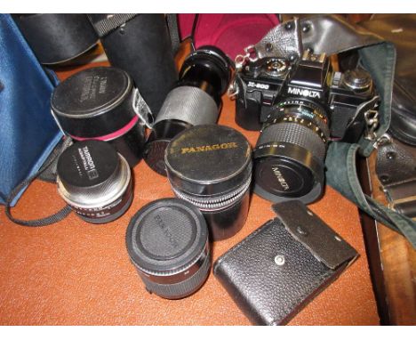 Minolta SLR X500 camera with various lenses including a Tameron CF television macro, 80 - 210, lens and other accessories in 