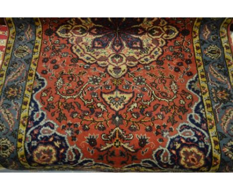 Meshed rug with medallion and all-over floral design on a rose ground with borders, 6ft x 3ft 6ins approximately
