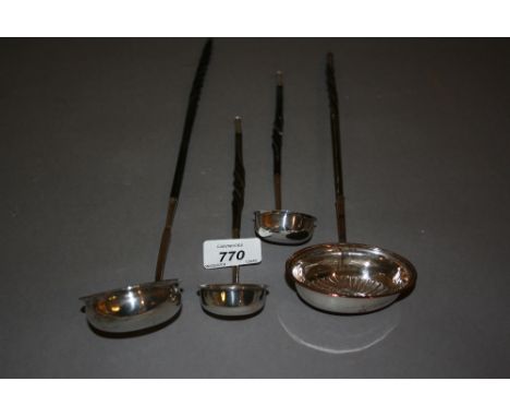 Two small Victorian silver toddy ladles with whale bone handles, similar larger ladle, unmarked together with a similar plate