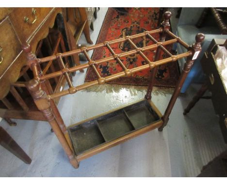 Edwardian mahogany twelve division stick stand with turned supports