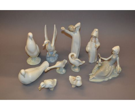 Pair of Lladro figures of children, a Lladro figure of a seated girl and two Lladro goose figures together with five Nao figu