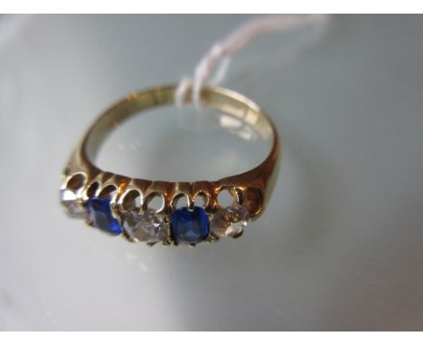 18ct Yellow gold five stone ring set, diamond, zircon and blue stone