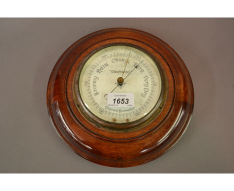Small circular aneroid barometer