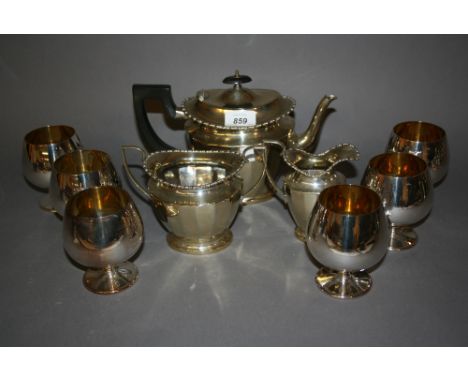 Three piece silver plated tea service together with a set of six plated brandy goblets